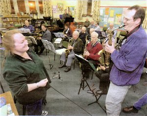 Gretchen Gustman is seranaded by Campbell McCracken and the members of the Highland Big Jazz Band